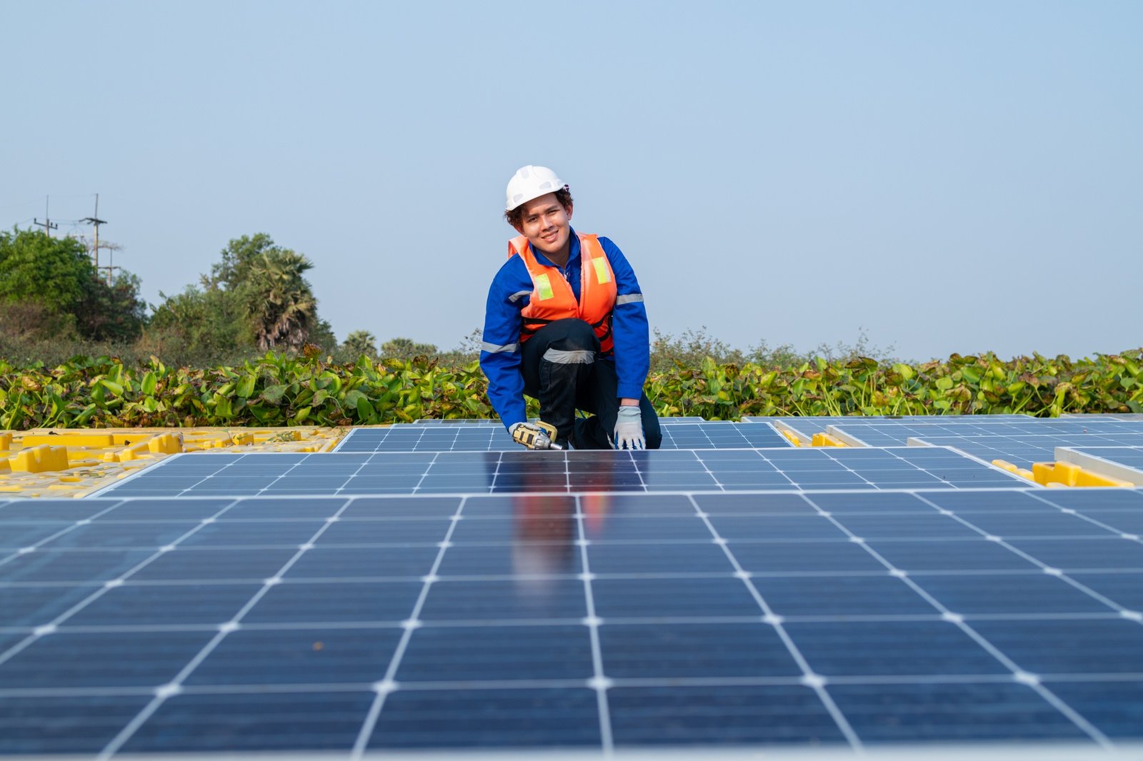 solar-engineer-performing-panel-maintenance.jpg